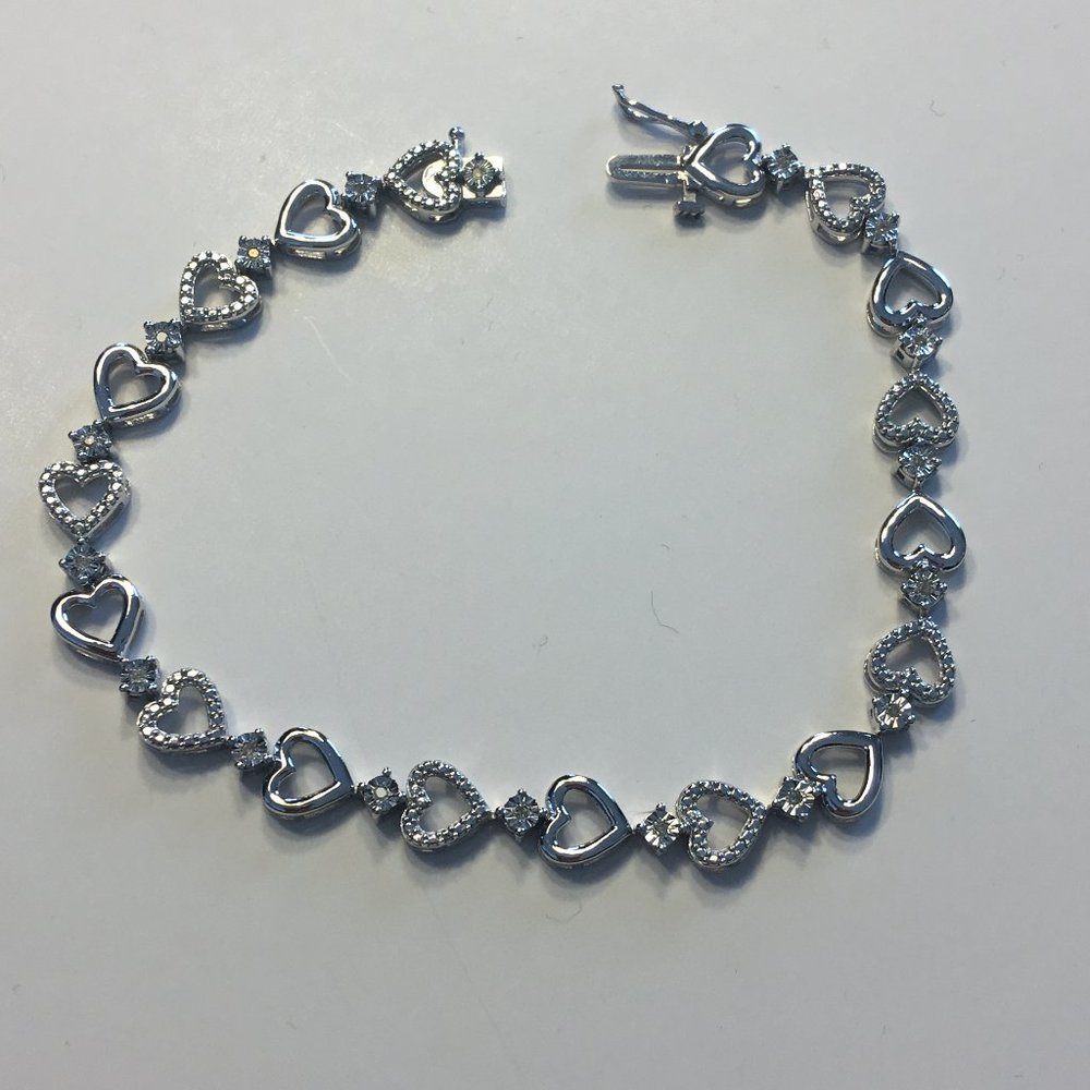 1/10 CT. T.W. White Diamond Heart Tennis Bracelet - Picture 6 of 9